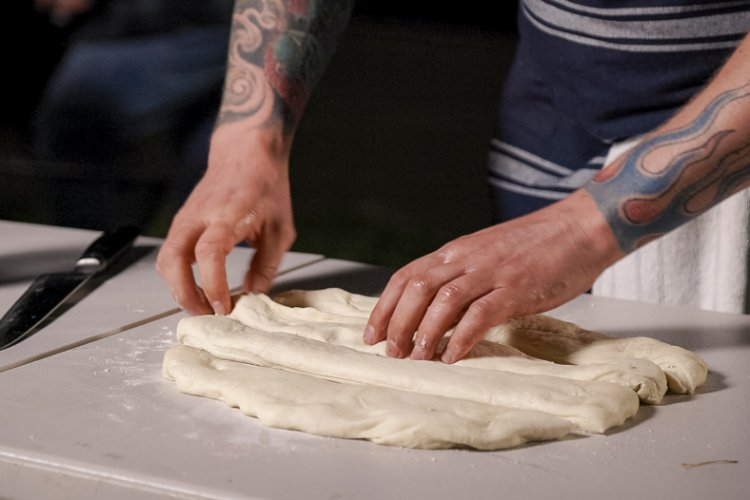 Image of When dough is risen, place on lightly floured working bench...